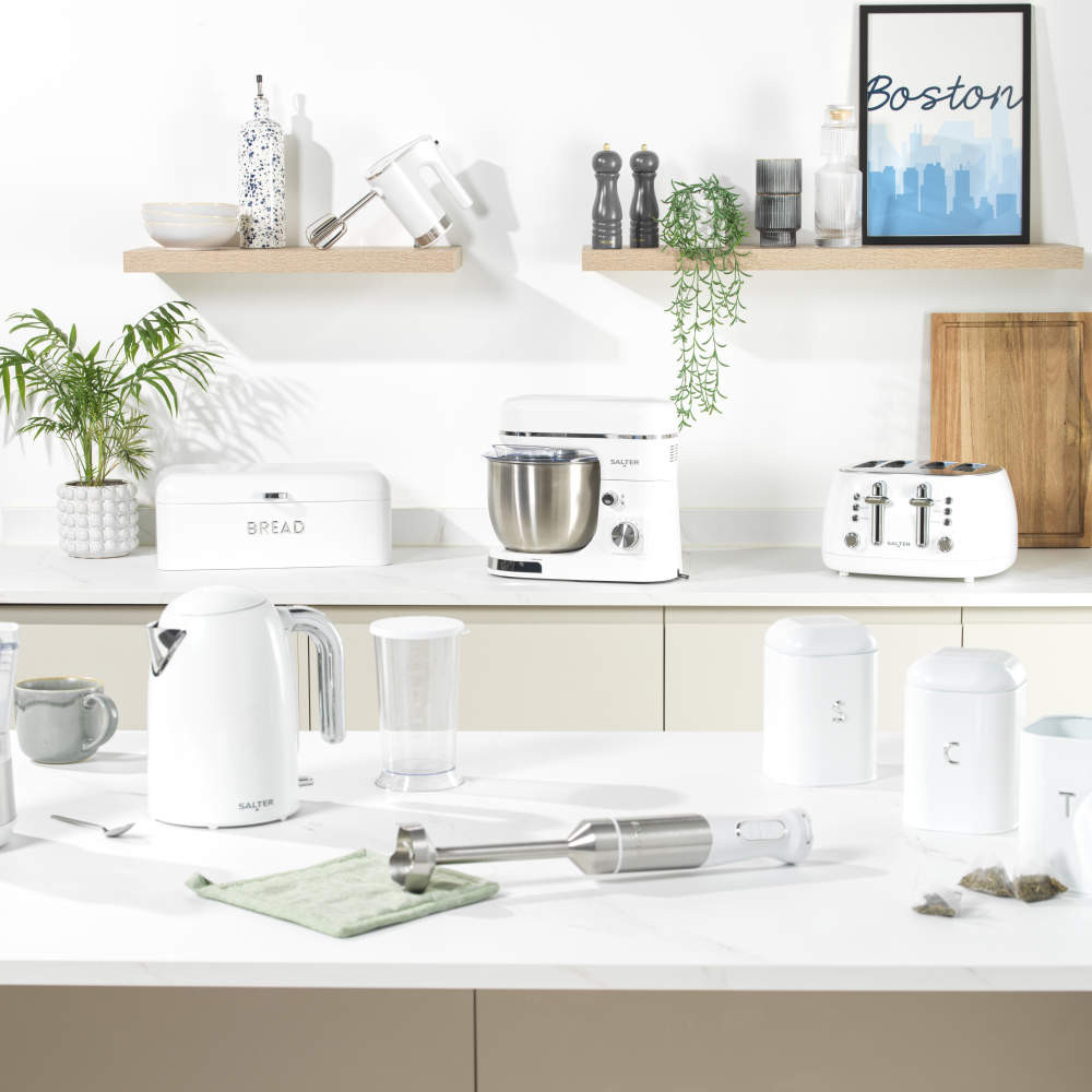 White electric kettle with chrome handle on kitchen counter