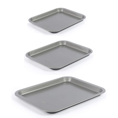 Set of three non-stick baking trays in different sizes, silver, angled view.