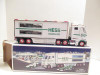 HESS  - 2003 - TRUCK W/RACE CARS  -  NEW IN THE BOX - SH