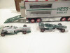 HESS  - 2003 - TRUCK W/RACE CARS  -  NEW IN THE BOX - SH