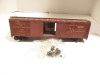 SCALE CHICAGO NORTH WESTERN 12" BOX CAR- BROKEN COUPLER - W80