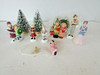 LEMAX CAROLER PORCELAIN FIGURINES & EXTRAS WITH 4 SNOW COVERED PINES ASST  H5