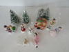 LEMAX CAROLER PORCELAIN FIGURINES & EXTRAS WITH 4 SNOW COVERED PINES ASST  H5