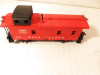 LIONEL POST-WAR HO TRAINS- 0857 ROCK ISLAND CABOOSE- GOOD - M12