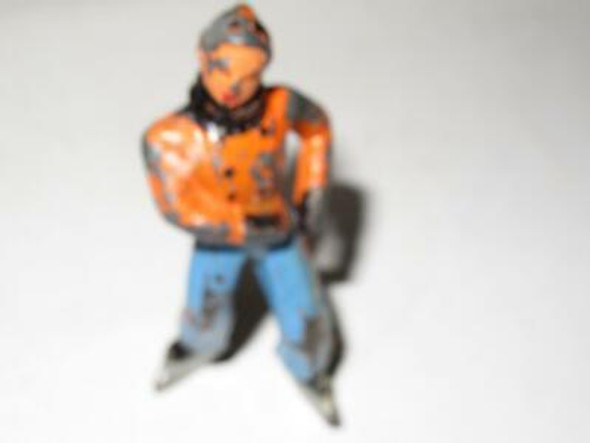 VINTAGE DIECAST FIGURE - WOMAN IN ORANGE ICE-SKATING- FAIR- M41