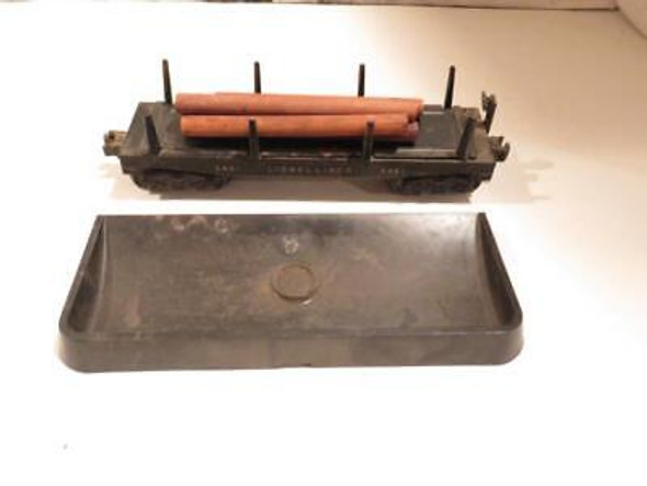 LIONEL POST-WAR TRAINS 3461 OPERATING METAL LOG DUMP CAR- W/LOGS- FAIR -H12A