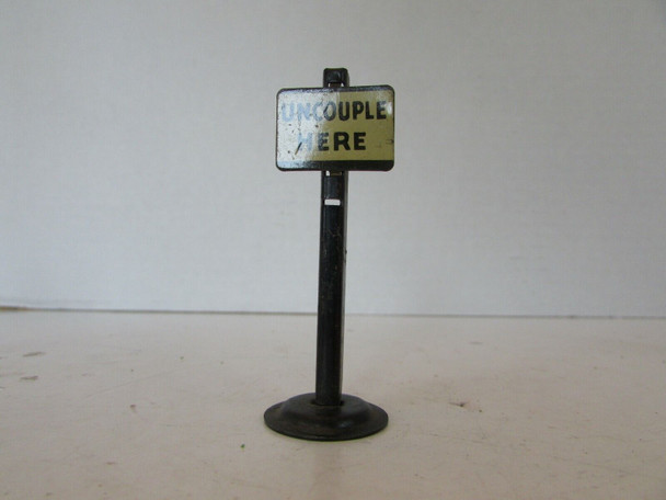 VINTAGE METAL RAILROAD TRACK SIGN UNCOUPLE HERE  2.75"  M41
