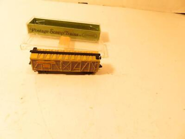 VINTAGE AURORA  N SCALE TRAINS - MOPAC STOCK CAR - LATCH COUPLERS- BXD- S31DD