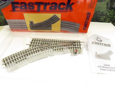 LIONEL FASTRACK 12017- 036 LEFT  HAND MANUAL SWITCH TRACK- BOXED- EXC.- SH