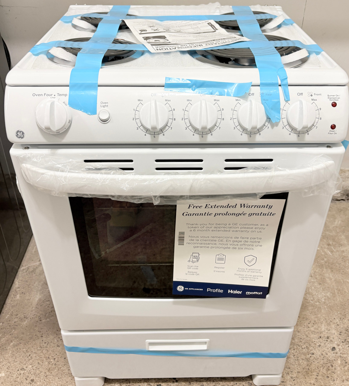 GE 24" Wide Open Box Apartment Size White Coil Top Stove, Free 60 Day Warranty