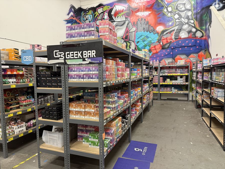 Stocked disposables aisle at the Bronco Distribution warehouse