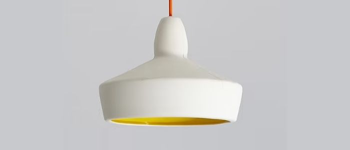 Stylish Room 9 ceramic pendant lamp shade in white with yellow interior detailing