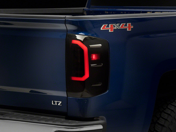 Raxiom 14-18 Chevrolet Silverado 1500 Axial Series LED Tail Lights- Black Housing (Smoked Lens) - MSM-T-597989