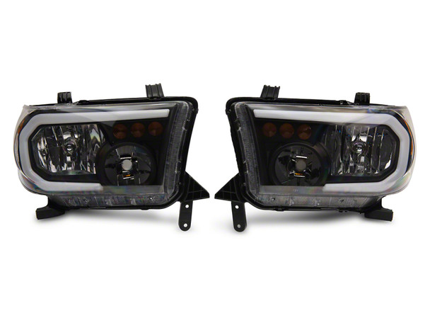 Raxiom 07-13 Toyota Tundra Axial Series Headlights w/ LED Bar- Black Housing (Clear Lens) - MSM-T-597830