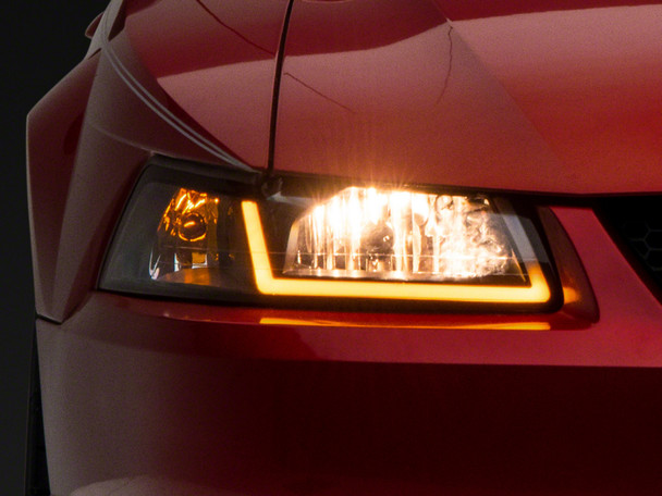 Raxiom 99-04 Ford Mustang Axial Series Headlights w/ Sequential LED Bar- Black Housing (Clear Lens) - MSM-T-598159