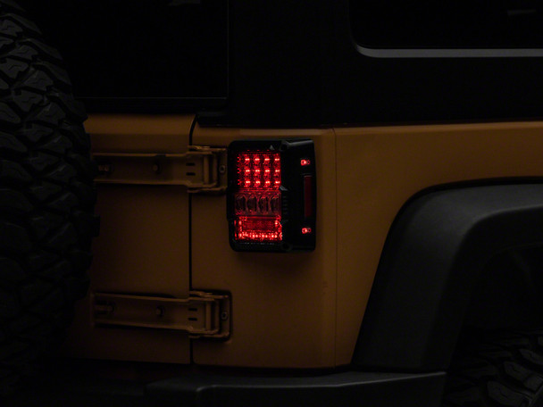 Raxiom 07-18 Jeep Wrangler JK Axial Series Lux LED Tail Lights- Black Housing (Clear Lens) - MSM-T-597880
