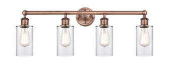 Edison Four Light Bath Vanity in Antique Copper (405|616-4W-AC-G802)