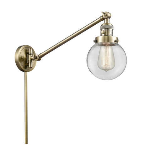 Franklin Restoration LED Swing Arm Lamp in Antique Brass (405|237-AB-G202-6-LED)