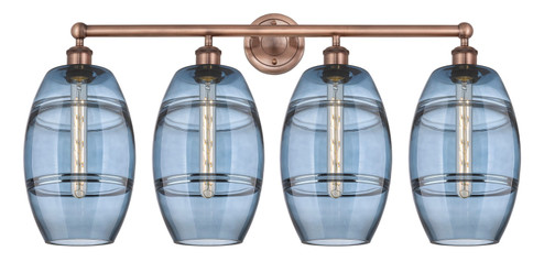 Edison Four Light Bath Vanity in Antique Copper (405|616-4W-AC-G557-8BL)