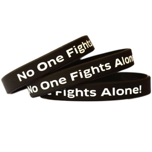 3 of Black No One Fights Alone Wristbands
