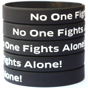 5 of Black No One Fights Alone Wristbands