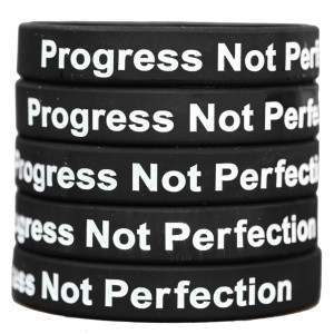 5 of Progress Not Perfection Wristbands