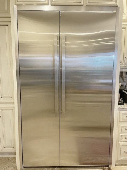 Built-in refrigerator with trim kit around edges
