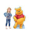 Life-size cardboard standee of Winnie the Pooh with model.