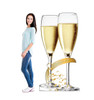 Life-size cardboard standee of Celebrate Champagne Glasses with model.