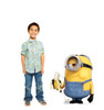 Life-size cardboard standee of Stuart Eating a Banana from The Minions with model.