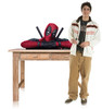 Life-size cardboard standee of Deadpool Tabletop with model.