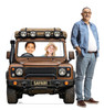 Life-size cardboard standee of a Safari Truck Standin with model.