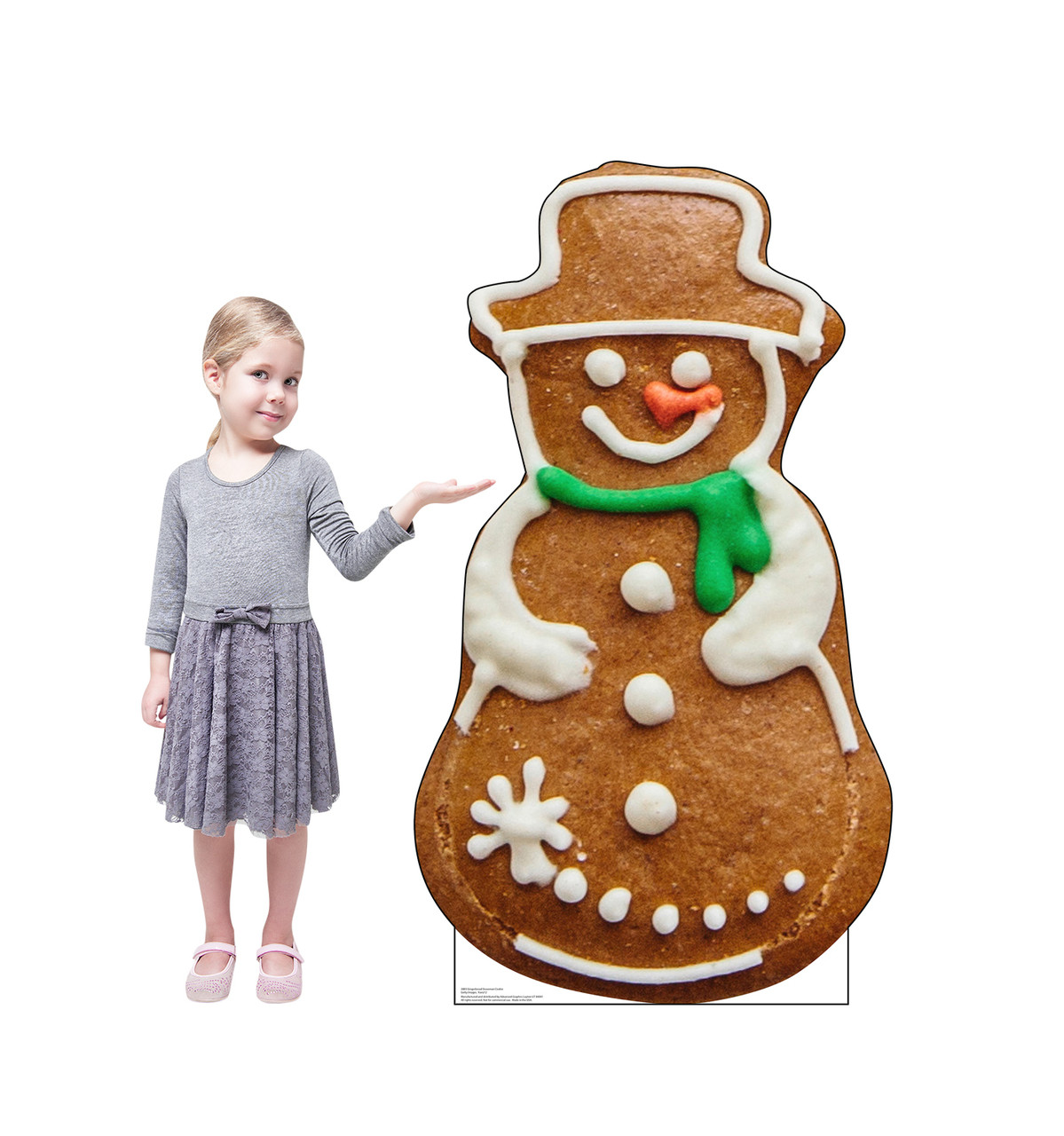Life-size cardboard standee of Gingerbread Snowman Cookie with model.