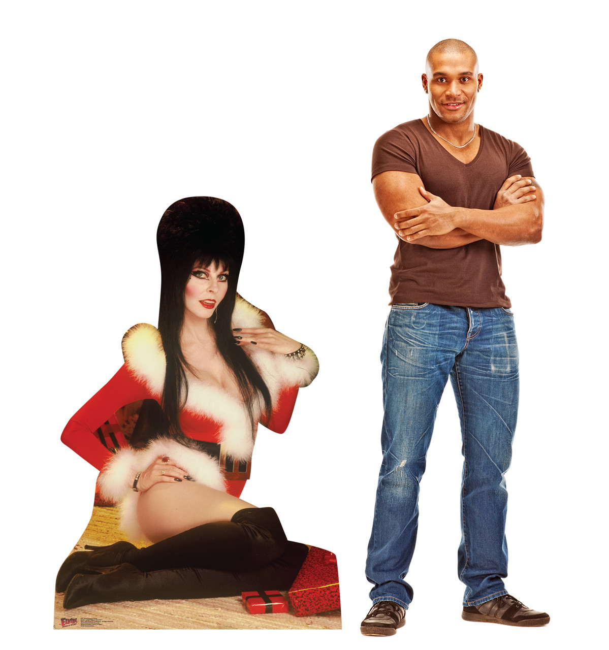 Life-size cardboard standee of Elvira Christmas Sitting with model.