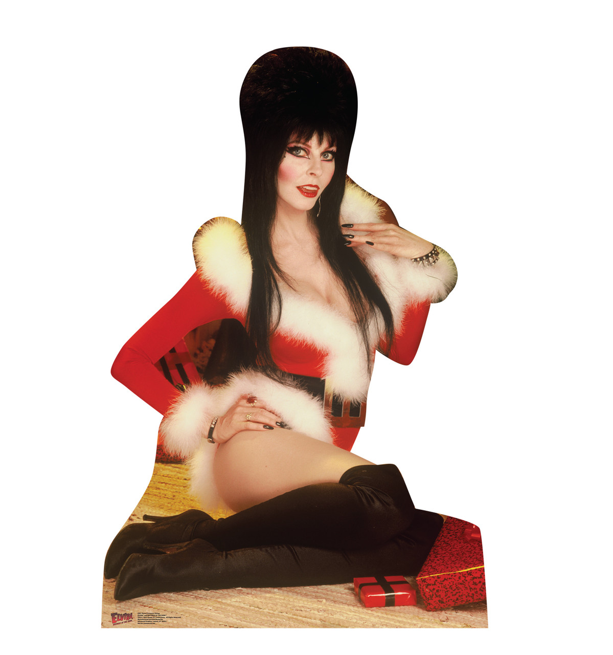 Life-size cardboard standee of Elvira Christmas Sitting.