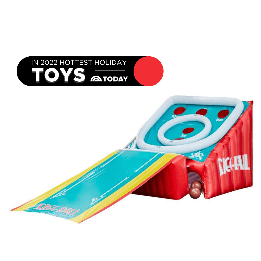 Large inflatable blue, yellow, and red game with Skee-Ball written on the side and brown blown up balls to roll up into the holes