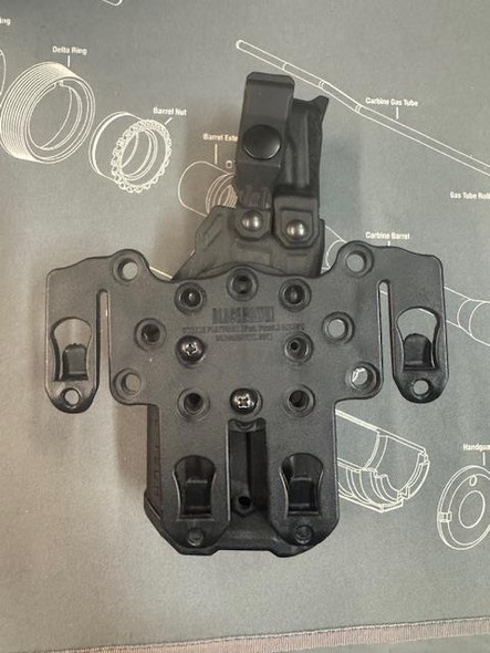 Bladetech Taser 7 Left Hand Draw Holster. W/ Blackhawk STRIKE platform