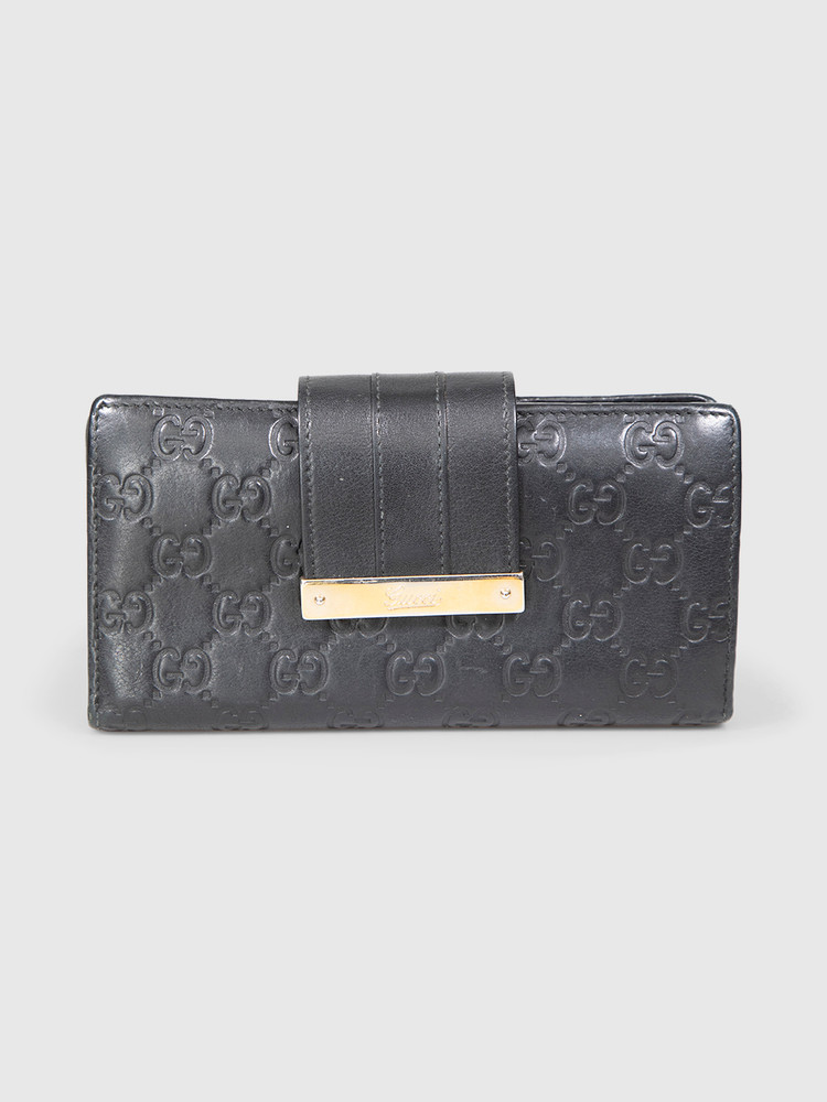 Gucci Black Leather Embossed Monogram Wallet