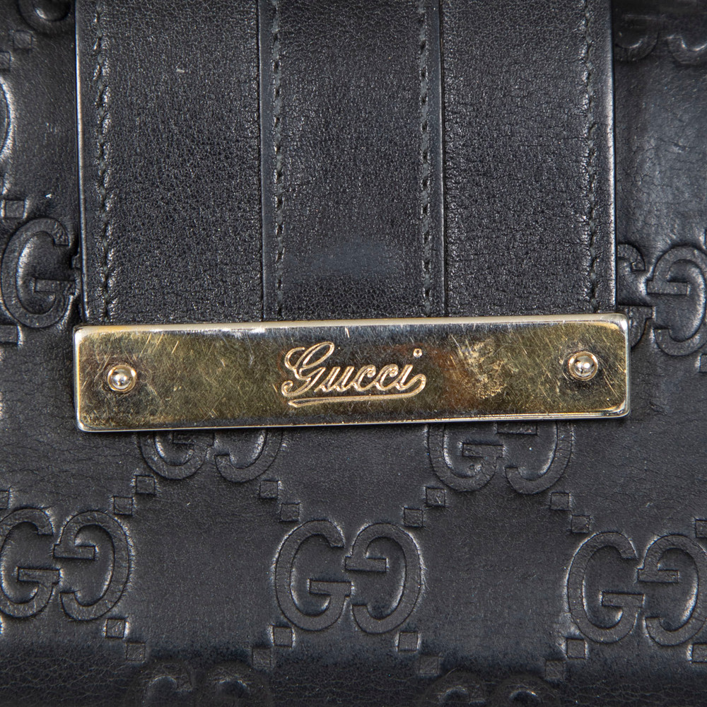 Gucci Black Leather Embossed Monogram Wallet