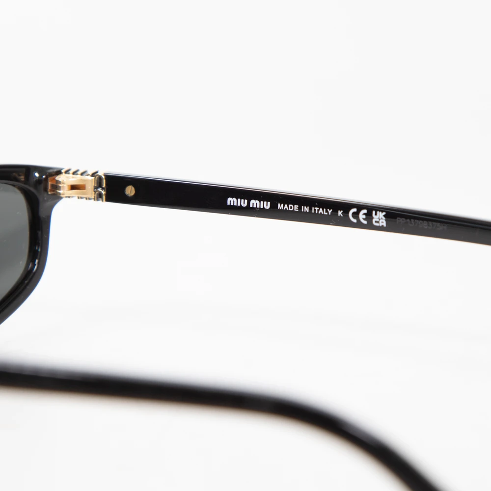 Miu Miu Black Oval Tinted Sunglasses