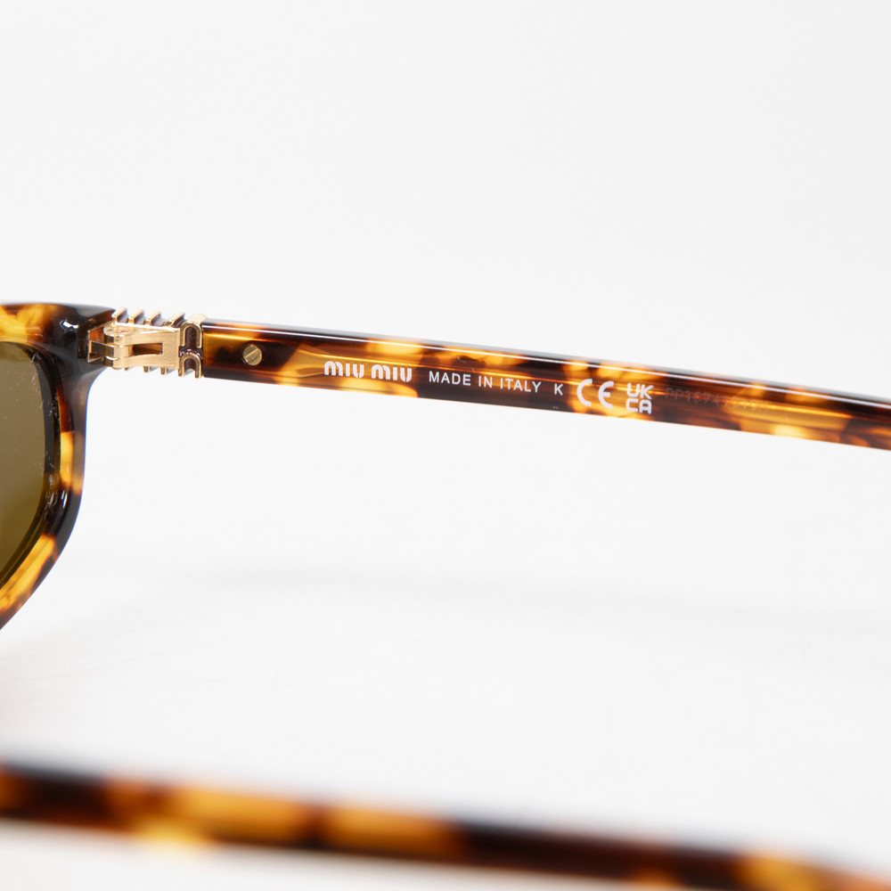 Miu Miu Havana Oval Tinted Sunglasses