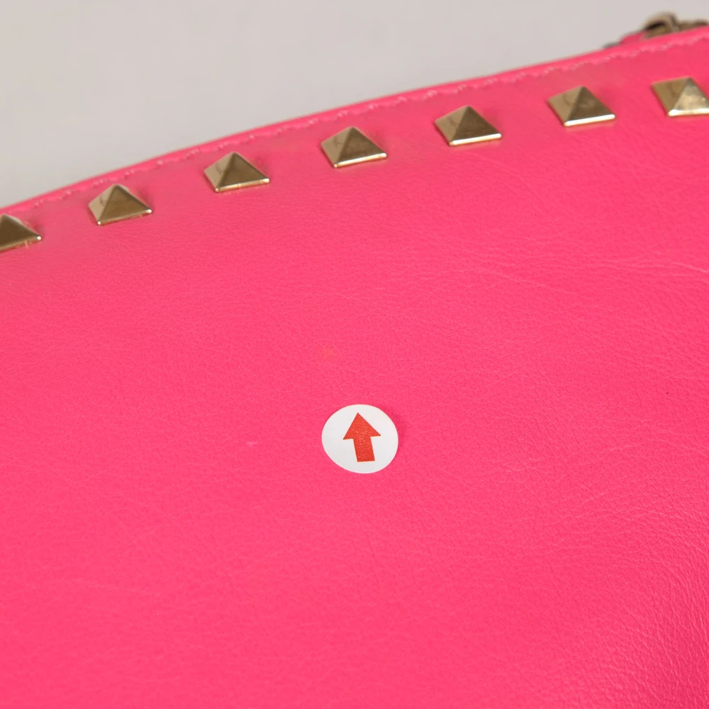 Valentino Garavani Neon Pink Rockstud Leather Clutch