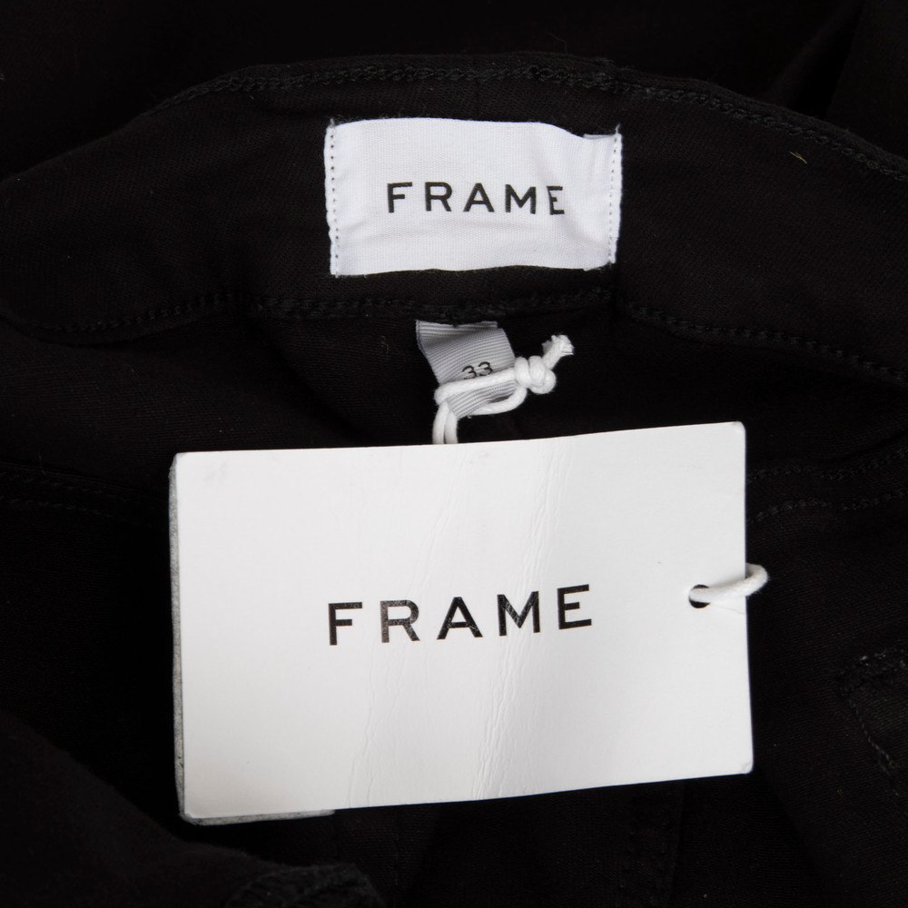 FRAME Black The Snapped Denim Legging