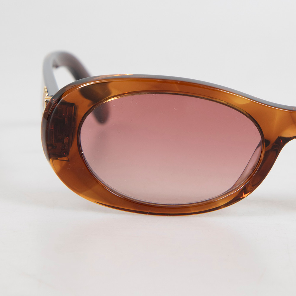 Miu Miu Striped Tobacco Oval Sunglasses