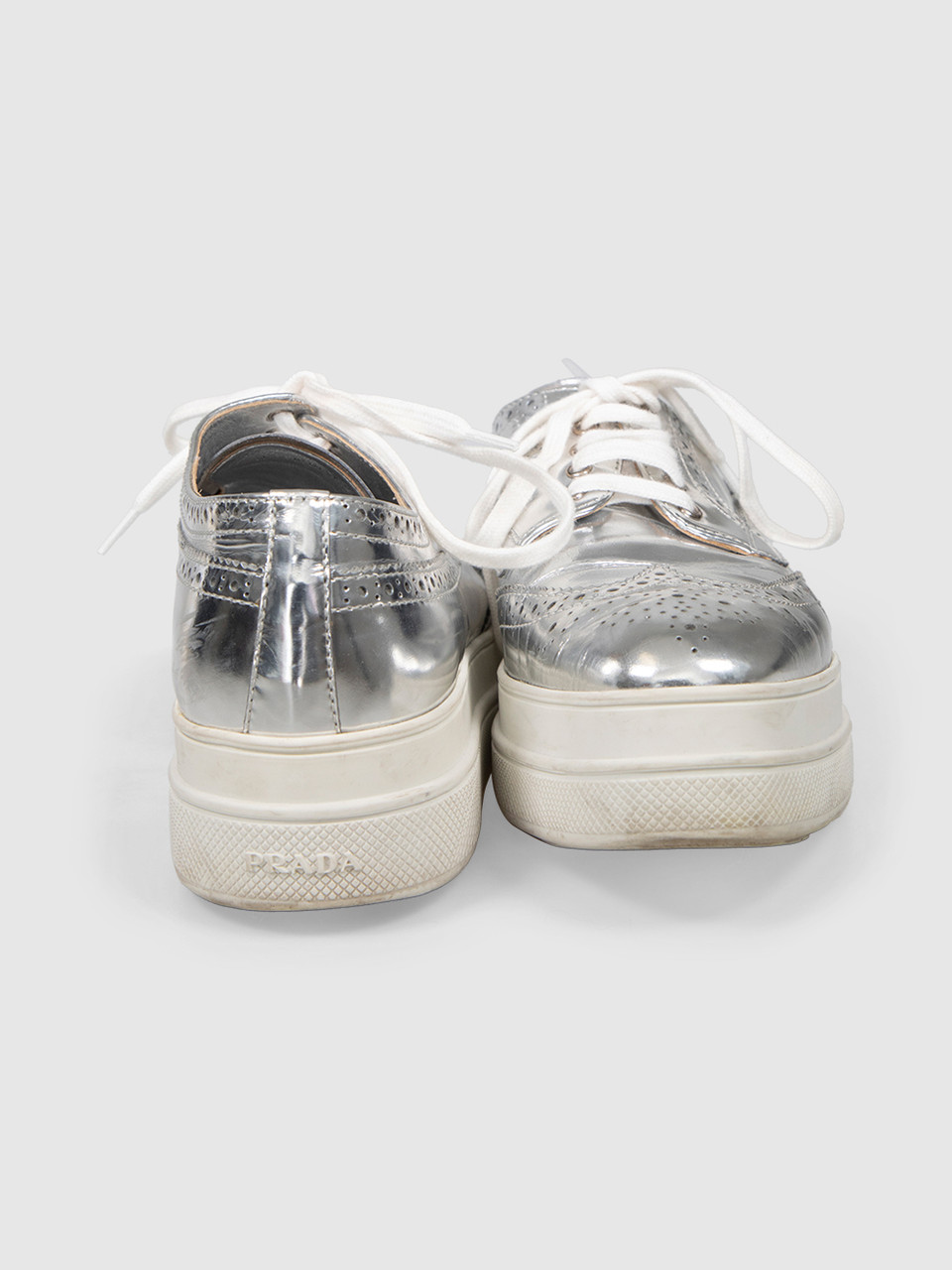 Prada Silver Patent Brogue Detail Flatforms Prada Silver Patent Brogue Detail Flatforms