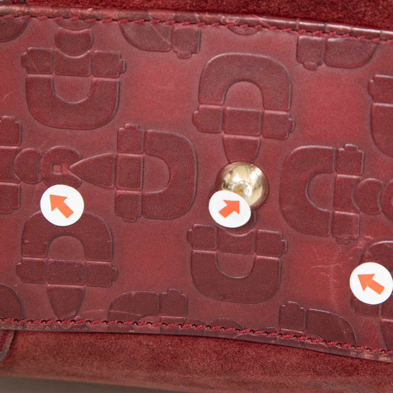 Gucci Bordeaux Leather Embossed Handbag