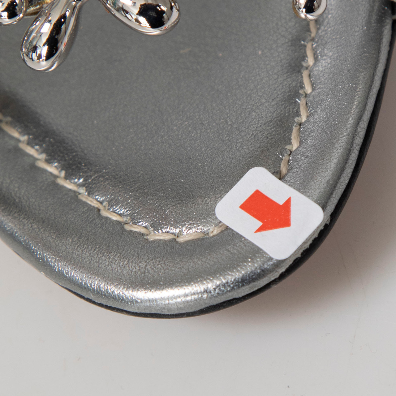 Alaïa Silver Leather Floral Wedge Sandals