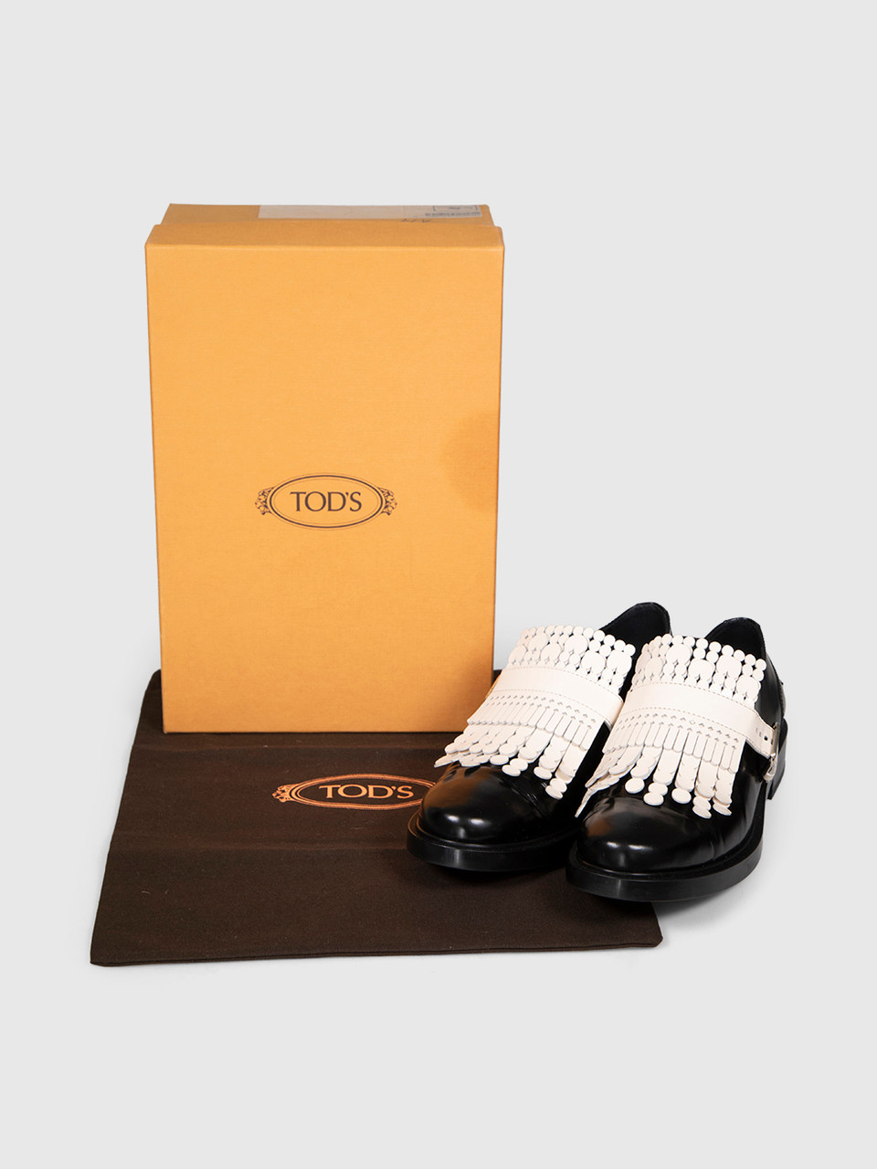 Tod's Black & White Fringed Leather Loafers