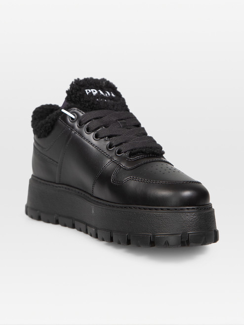 Prada Black leather Shearling Lined Trainers