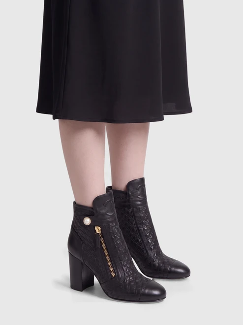 Chanel 2019 Black Quilted Leather CC Boots